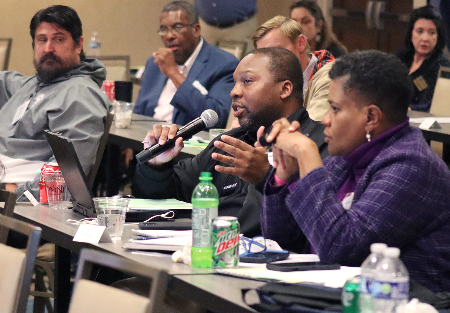 An attendee asks panelists a question during the 2025 SCAC Insurance Trusts Meeting.