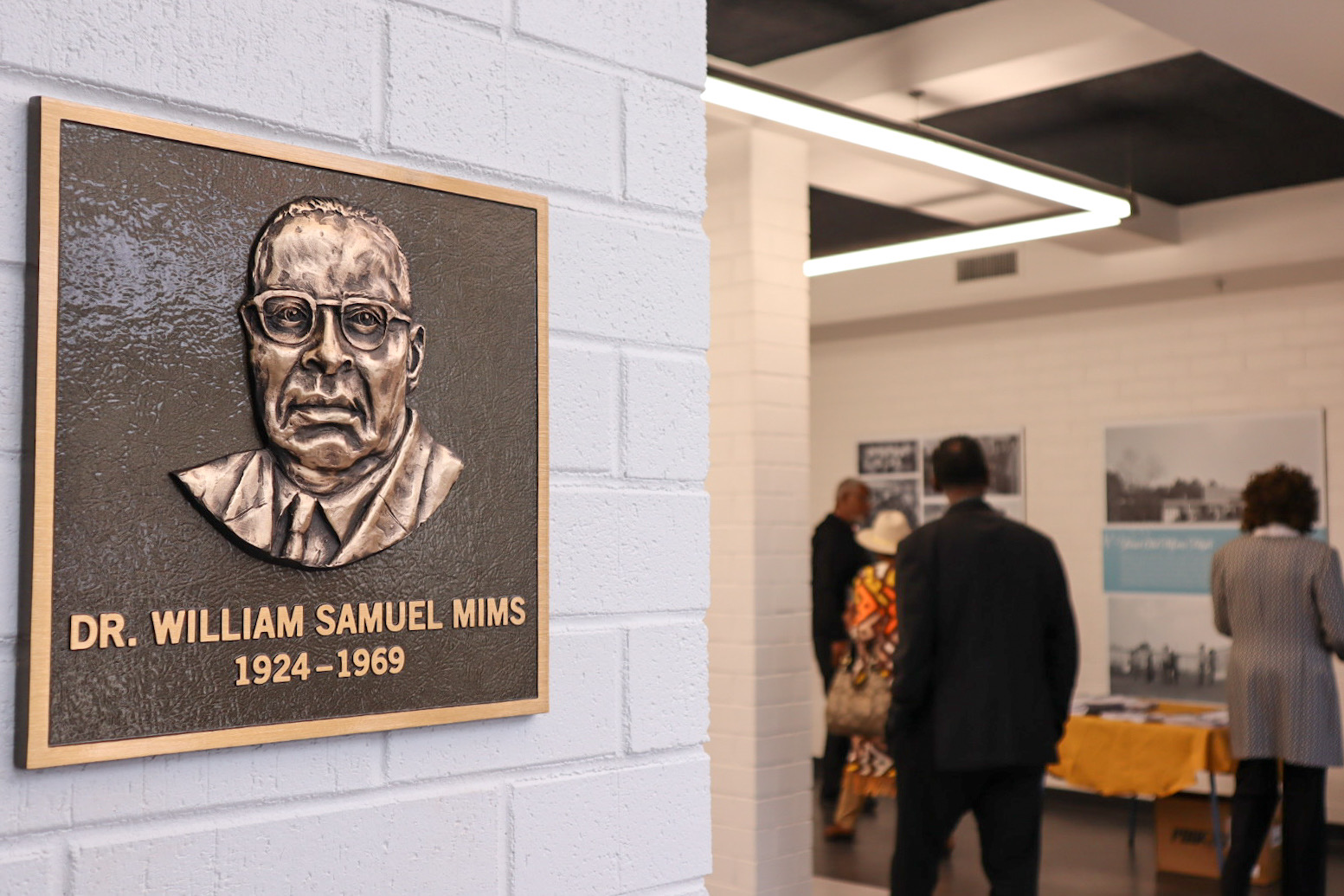 A plaque featuring W. S. Mims is displayed in the entryway of the newly renovated Mims Activity Center.